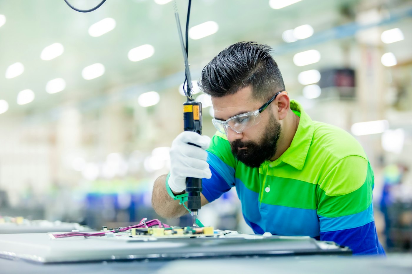 A machinist at work on a shop floor